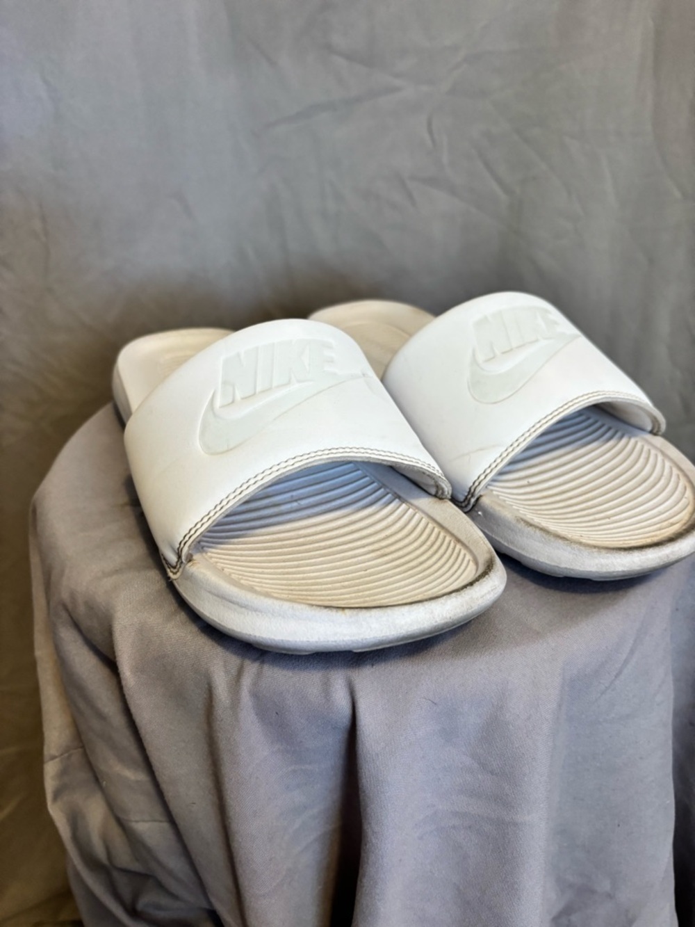 Nike White Slide Sandals with Embossed Logo